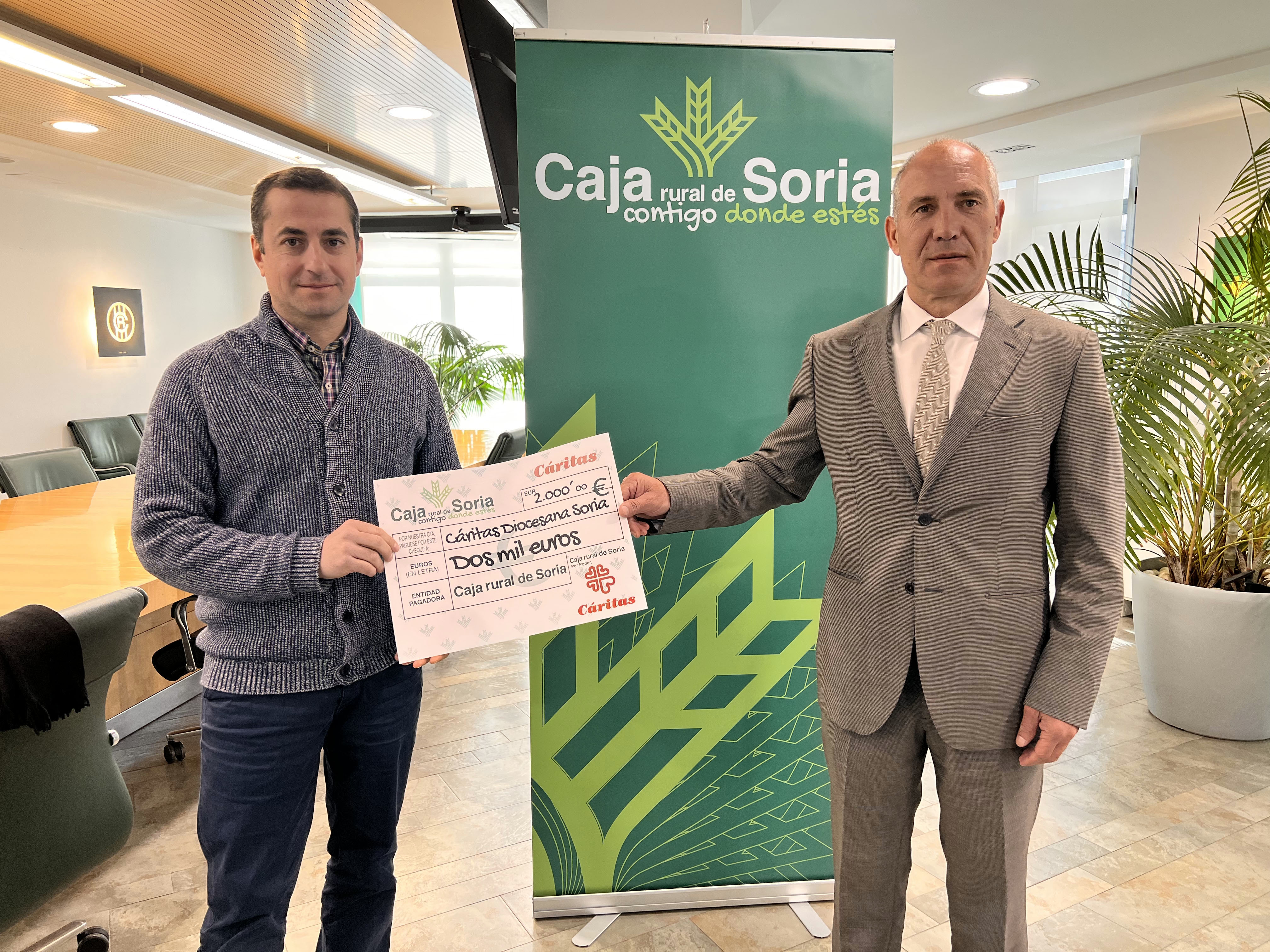 Ismael Ruiz, Director de negocio de Caja Rural de Soria y Alberto Martín, gerente de Cáritas Diocesana de Soria