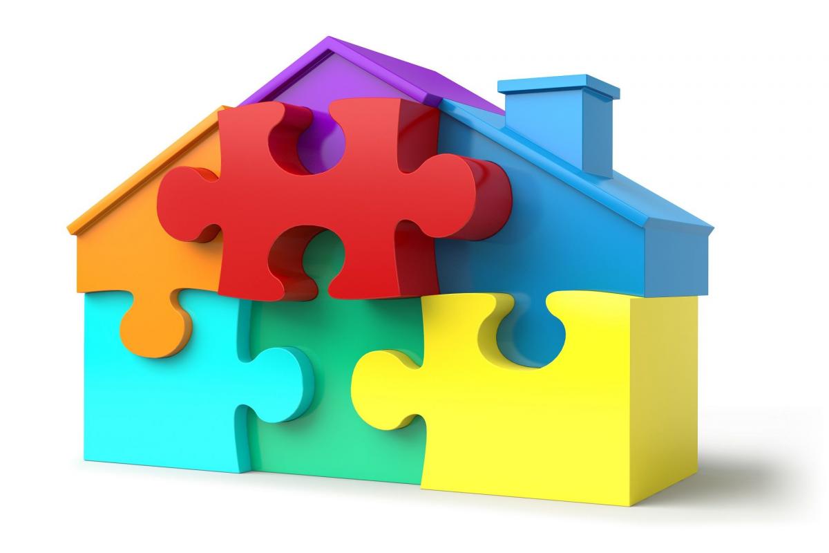 Casa hecha con piezas de puzzle Casa hecha con piezas de puzzle